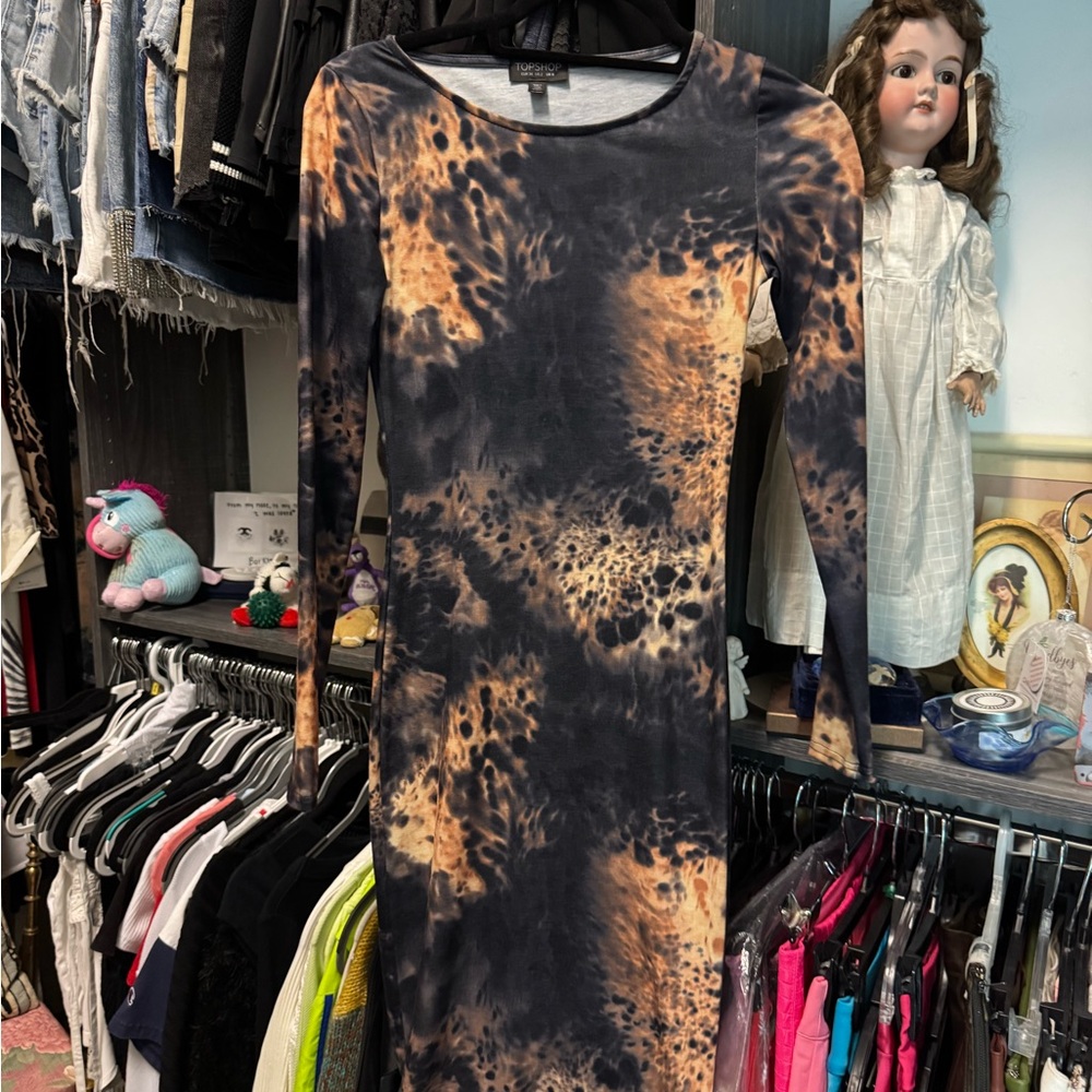 Midi dress…multi color browns black
Never worn